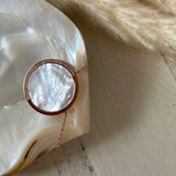 Amulet Necklace - white mother-of-pearl, rose gold vermeil, cubic zirconia, 18in by Nishi Pearls, styled lifestyle photo