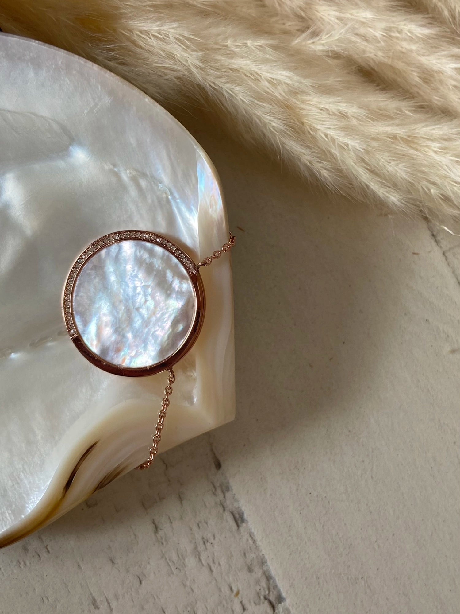Amulet Necklace - white mother-of-pearl, rose gold vermeil, cubic zirconia, 18in by Nishi Pearls, styled lifestyle photo
