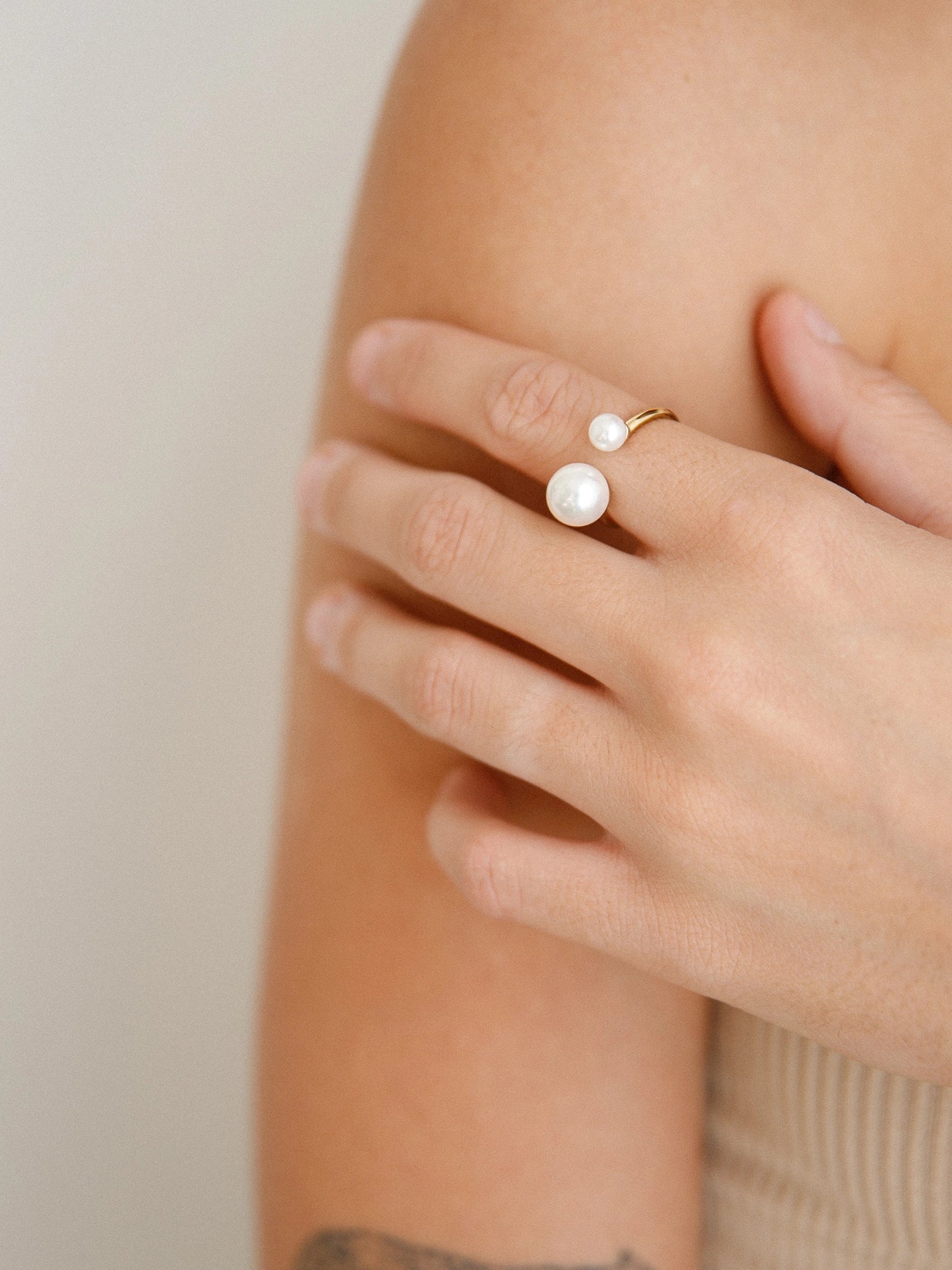 Asymmetrical Opened Ring - mixed-size white freshwater pearl ring in yellow gold vermeil by Nishi Pearls, styled on a model