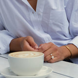 Asymmetrical Opened Ring - mixed-size white freshwater pearl ring in yellow gold vermeil by Nishi Pearls, on a model, angle