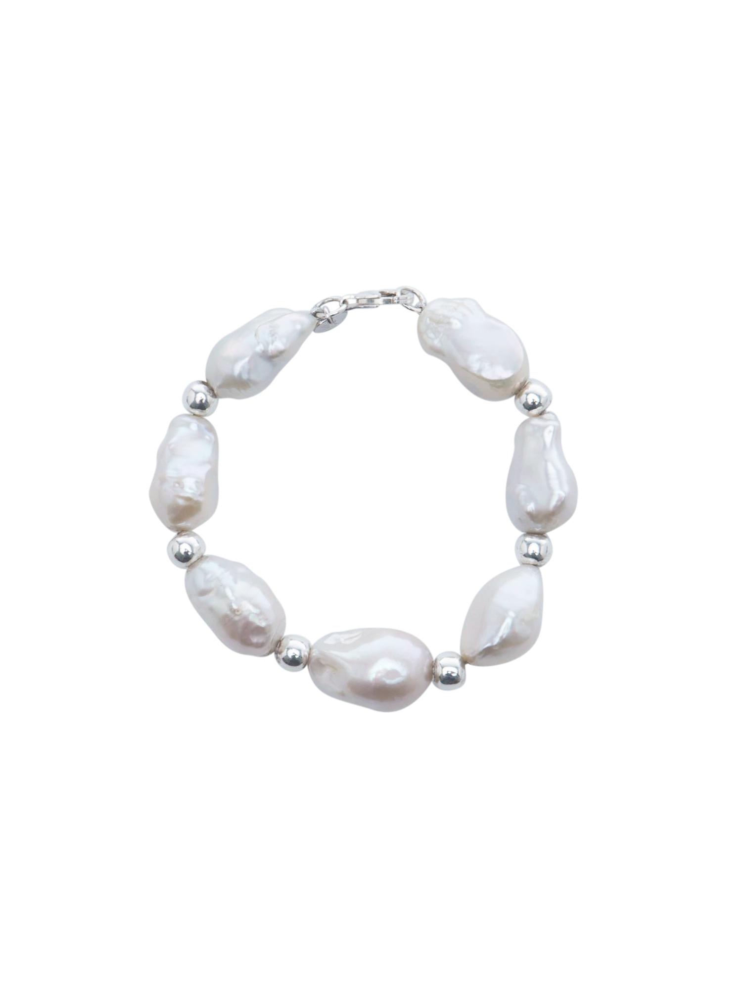 Baroque Bead Bracelet - mixed-size white baroque freshwater pearls in sterling silver, 7.5in by Nishi Pearls, studio view

