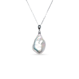 Baroque Necklace - mixed-size white baroque freshwater pearls in sterling silver, 16.5-18in by Nishi Pearls, studio view