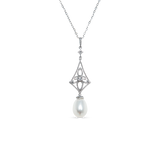 Beaded Drop Necklace - 8-9mm white freshwater pearls in sterling silver, 16.5-18in by Nishi Pearls, studio view
