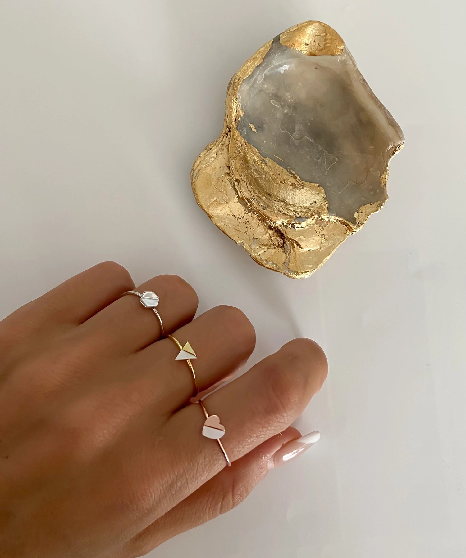 Blushed Heart Ring - white mother-of-pearl ring in rose gold vermeil by Nishi Pearls, worn on a model