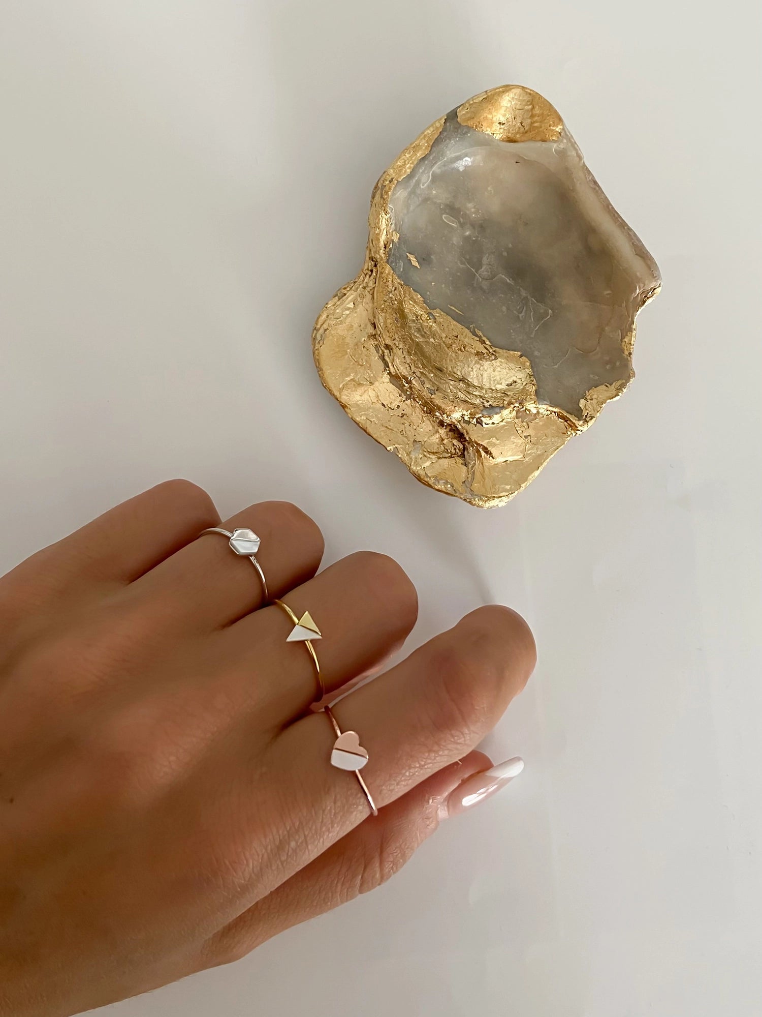 Blushed Heart Ring - white mother-of-pearl ring in rose gold vermeil by Nishi Pearls, worn on a model