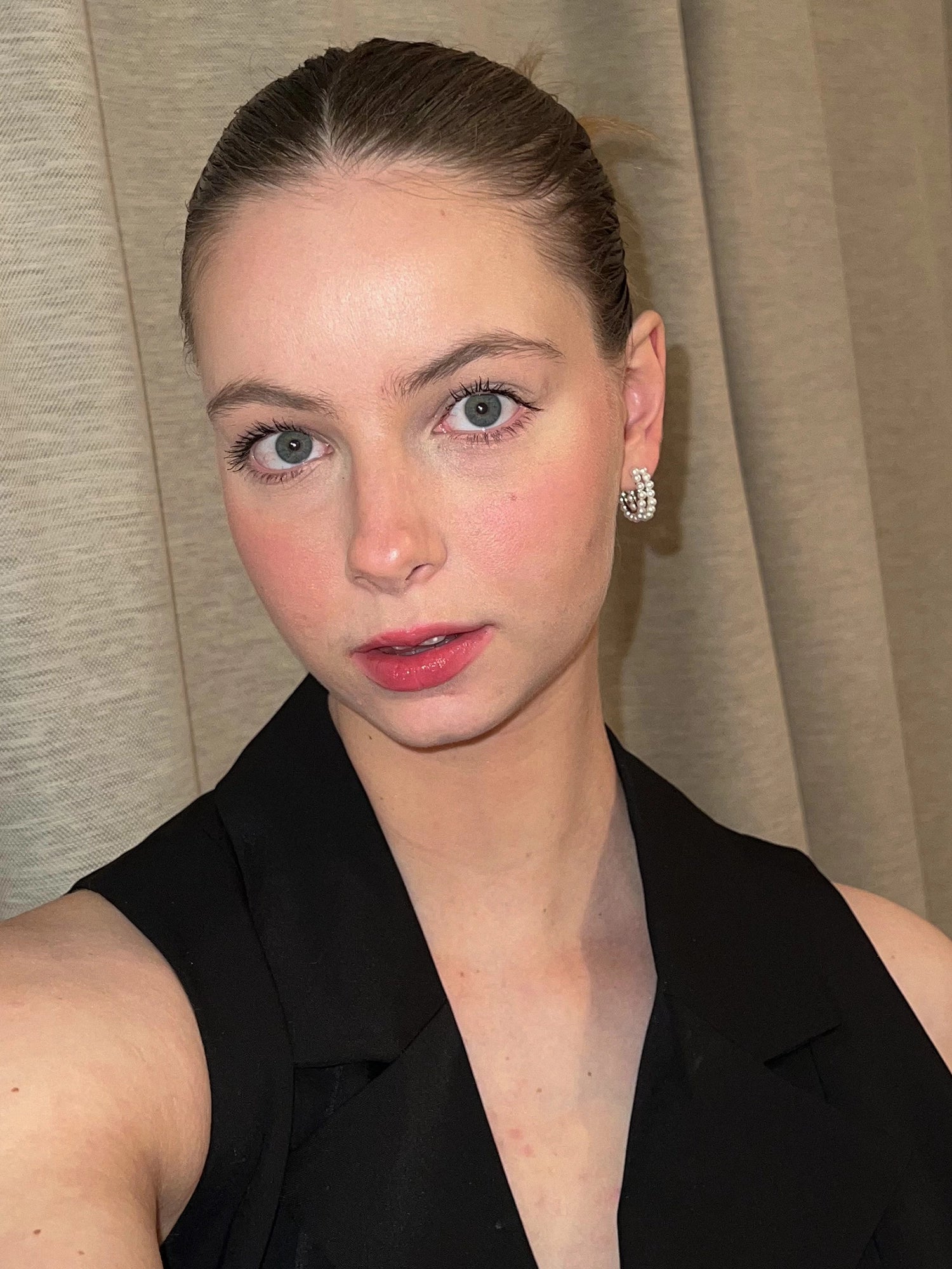 Celia Hoops - 3-4mm white round freshwater pearl earrings in sterling silver by Nishi Pearls, worn on a model