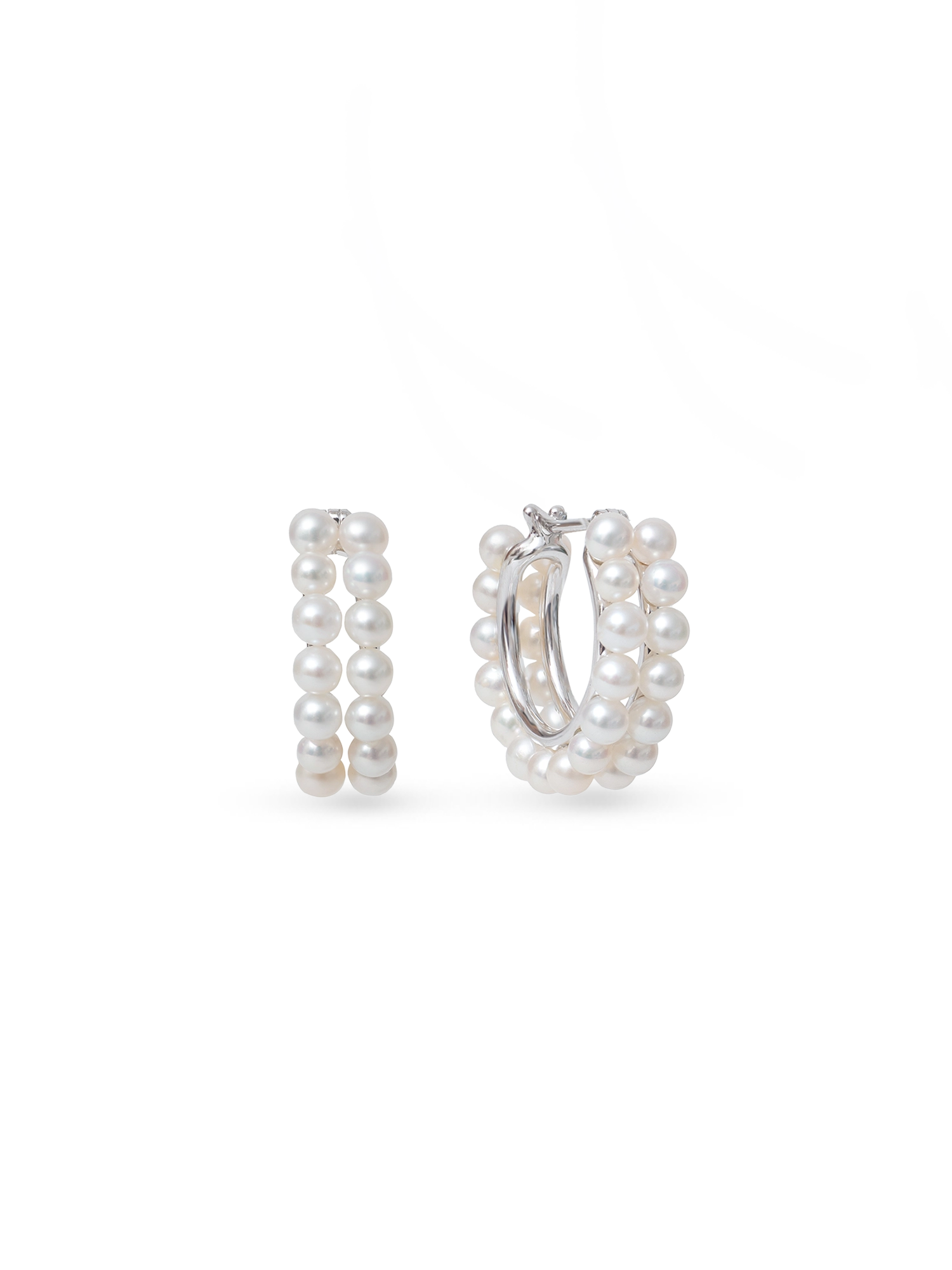 Celia Hoops - 3-4mm white round freshwater pearl earrings in sterling silver by Nishi Pearls, studio view