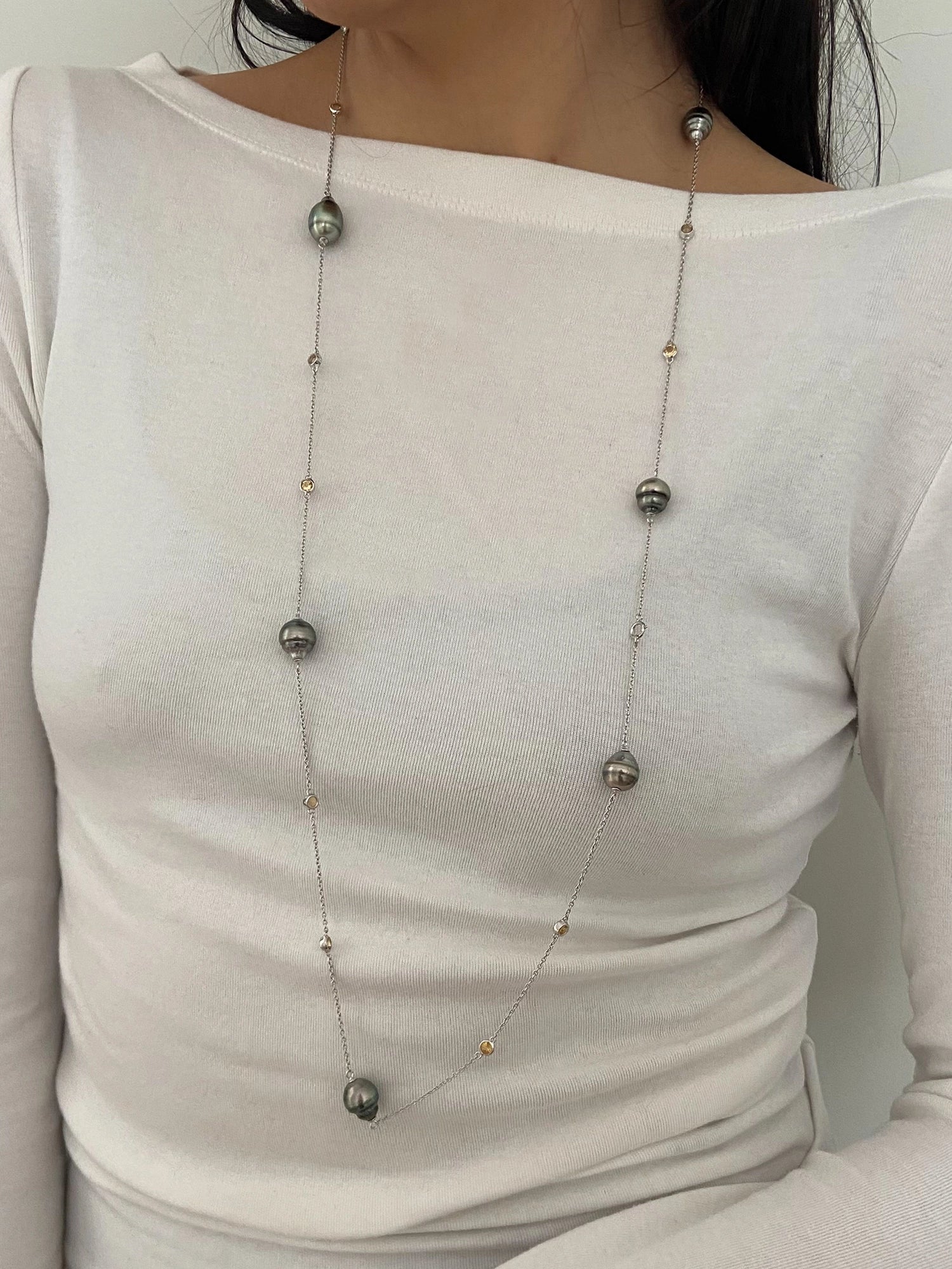 Citrine Necklace - black Tahitian pearl necklace in sterling silver, 38in by Nishi Pearls, worn on a model