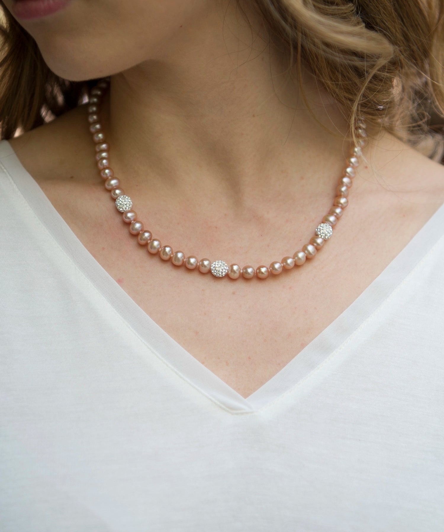 Crystal Bead Necklace - 6-7mm pink freshwater pearl necklace in sterling silver by Nishi Pearls, worn on a model