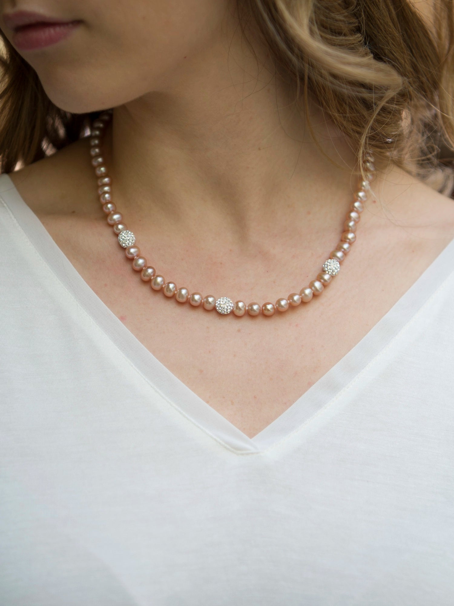 Crystal Bead Necklace - 6-7mm pink freshwater pearl necklace in sterling silver by Nishi Pearls, worn on a model