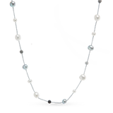 Crystal Path Necklace - mixed-size white freshwater pearl necklace in sterling silver, 17in by Nishi Pearls, studio view