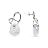 Curvella Earring - mixed-size white baroque freshwater pearl earrings in sterling silver by Nishi Pearls, studio view