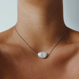 Daisy Necklace - 14-15mm white baroque freshwater pearls in sterling silver, 15-17in by Nishi Pearls, worn on a model