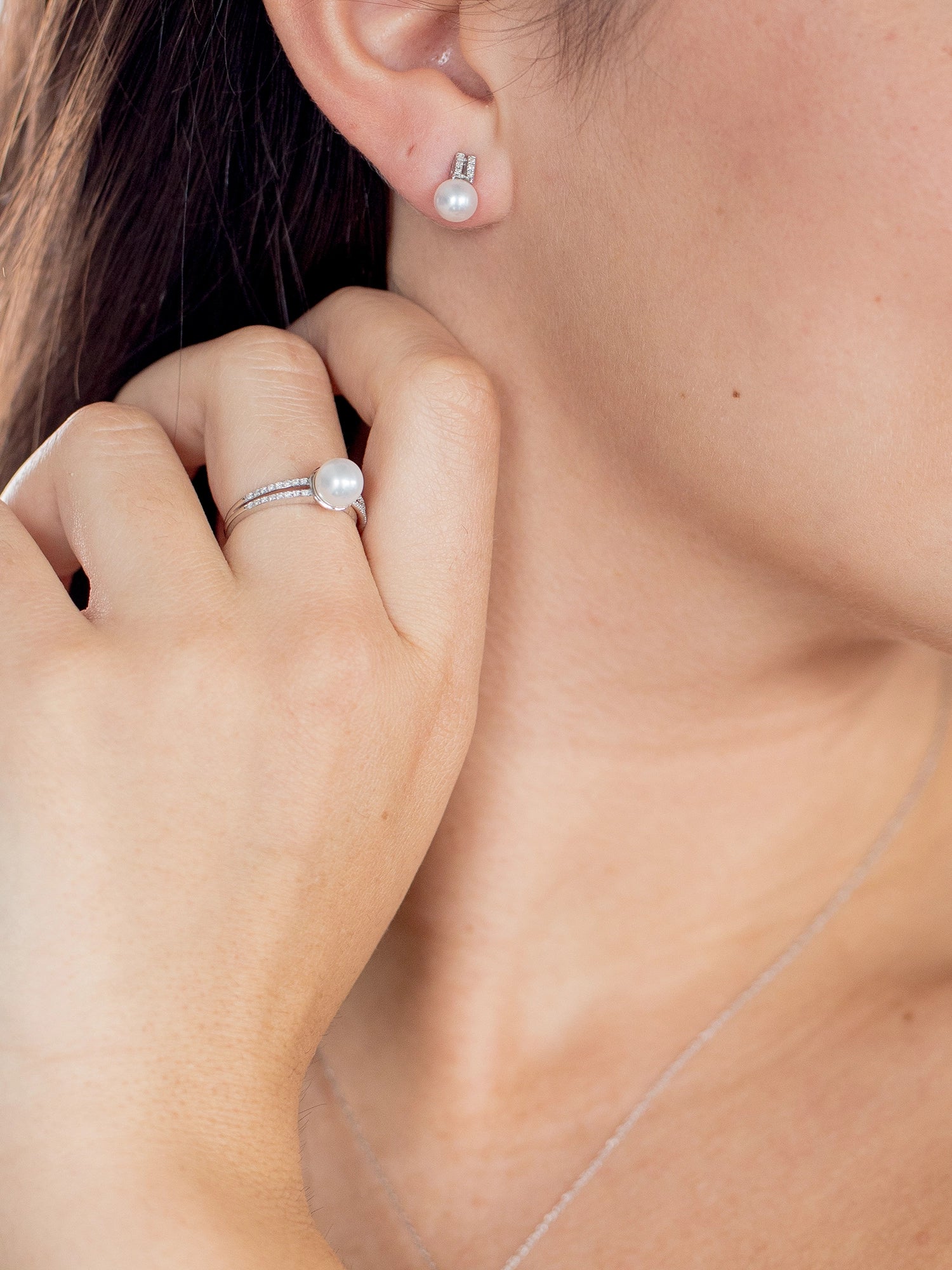 Diamond Mini Bar Ring - 7-8mm white round freshwater pearl ring in 10kt white gold by Nishi Pearls, worn on a model
