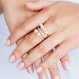 Double Band Ring - freshwater pearl ring in rose gold vermeil with white topaz by Nishi Pearls, worn on a model
