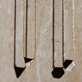 Golden Hour Necklace - white mother-of-pearl, yellow gold vermeil, 16.5-18in by Nishi Pearls, styled flat lay