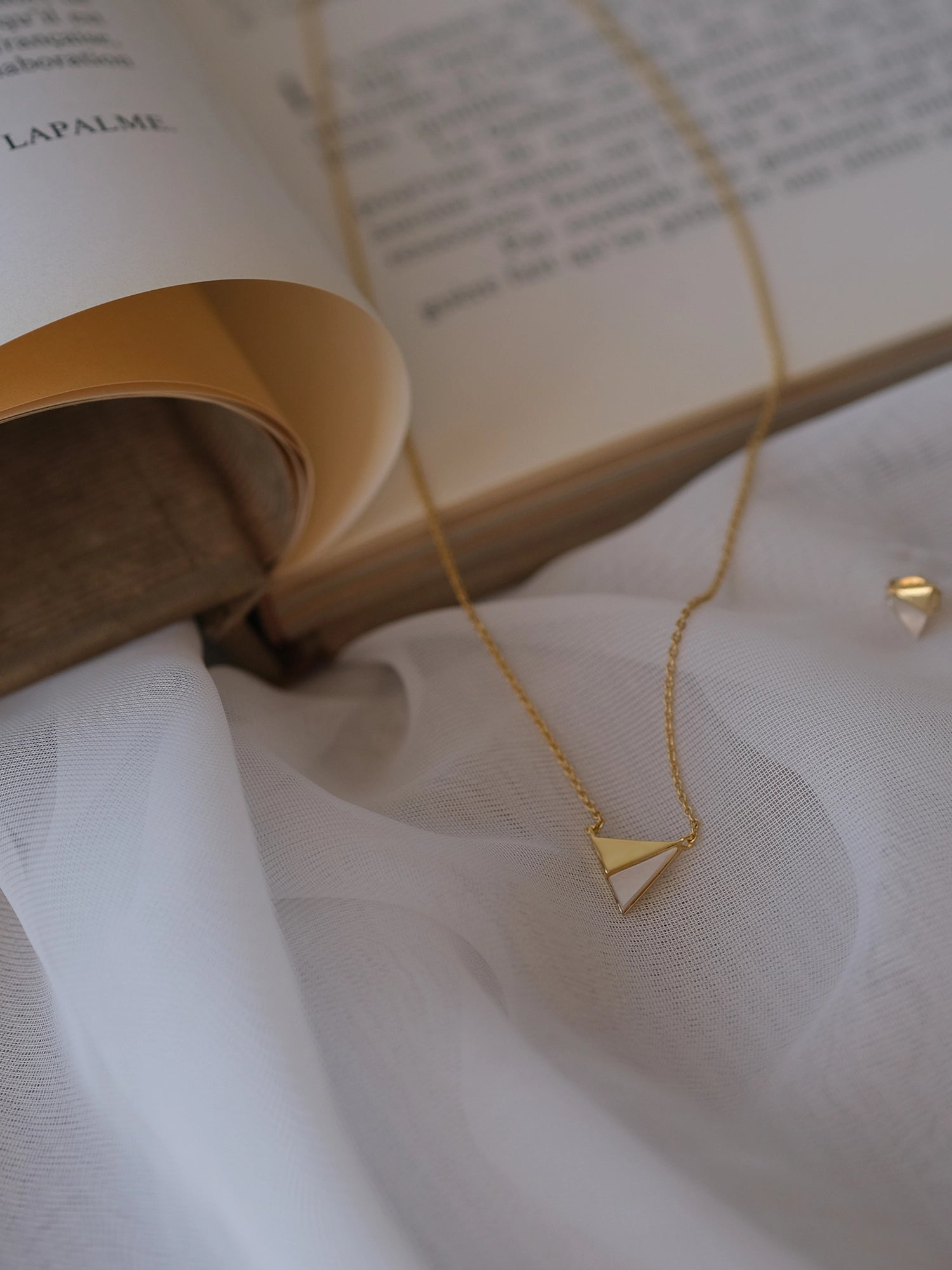 Golden Hour Necklace - white mother-of-pearl, yellow gold vermeil, 16.5-18in by Nishi Pearls, styled lifestyle photo