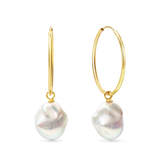 Holly Hoops - mixed-size white baroque freshwater pearl earrings in yellow gold vermeil by Nishi Pearls, studio view