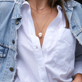 Holly Necklace - 16-17mm white baroque freshwater pearls in gold vermeil, 14-22in by Nishi Pearls, alternate model angle