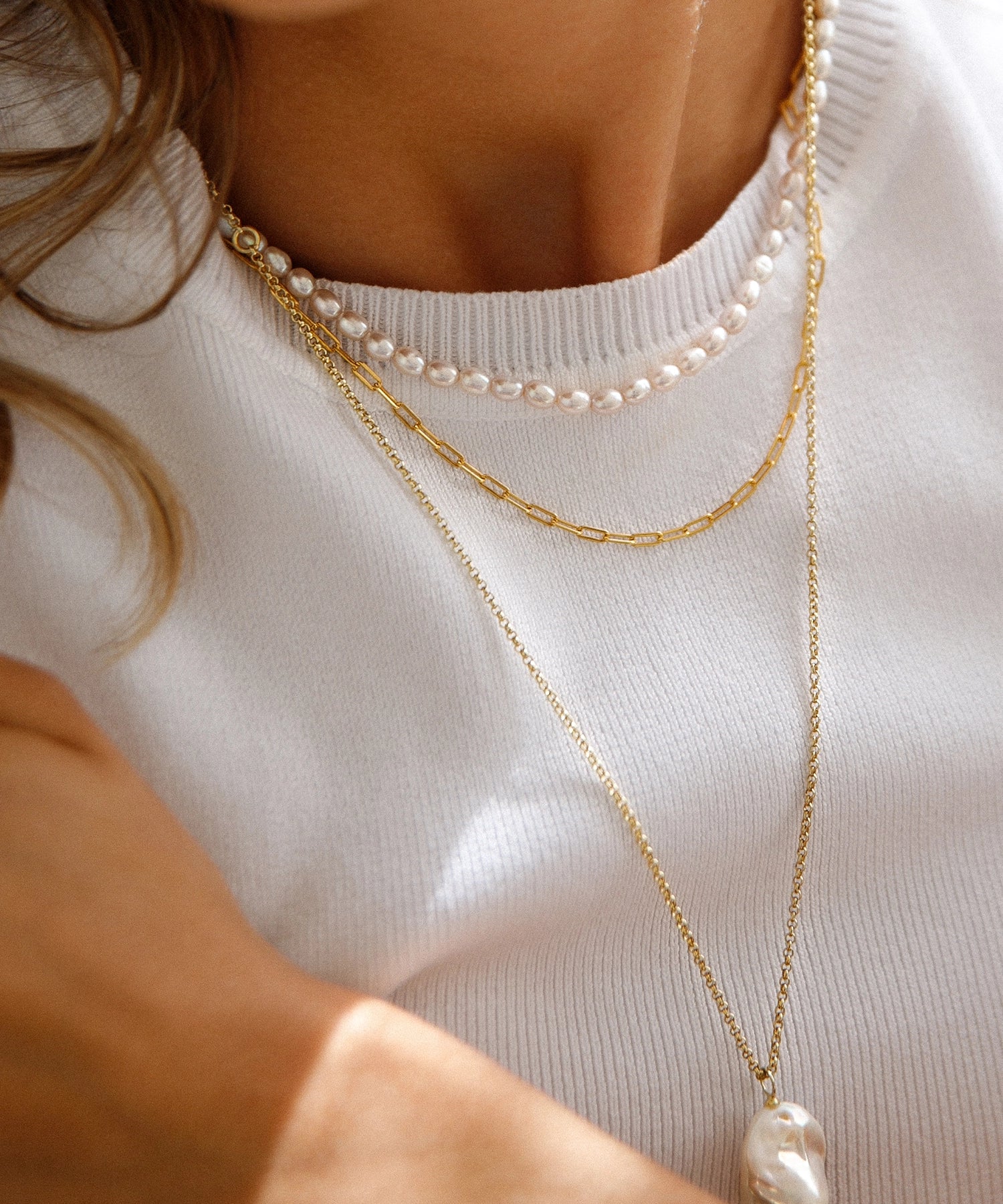 Holly Necklace - 16-17mm white baroque freshwater pearls in gold vermeil, 14-22in by Nishi Pearls, worn on a model