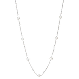 Keshi Pebble Necklace - mixed-size white freshwater pearl necklace in sterling silver, 36in by Nishi Pearls, studio view