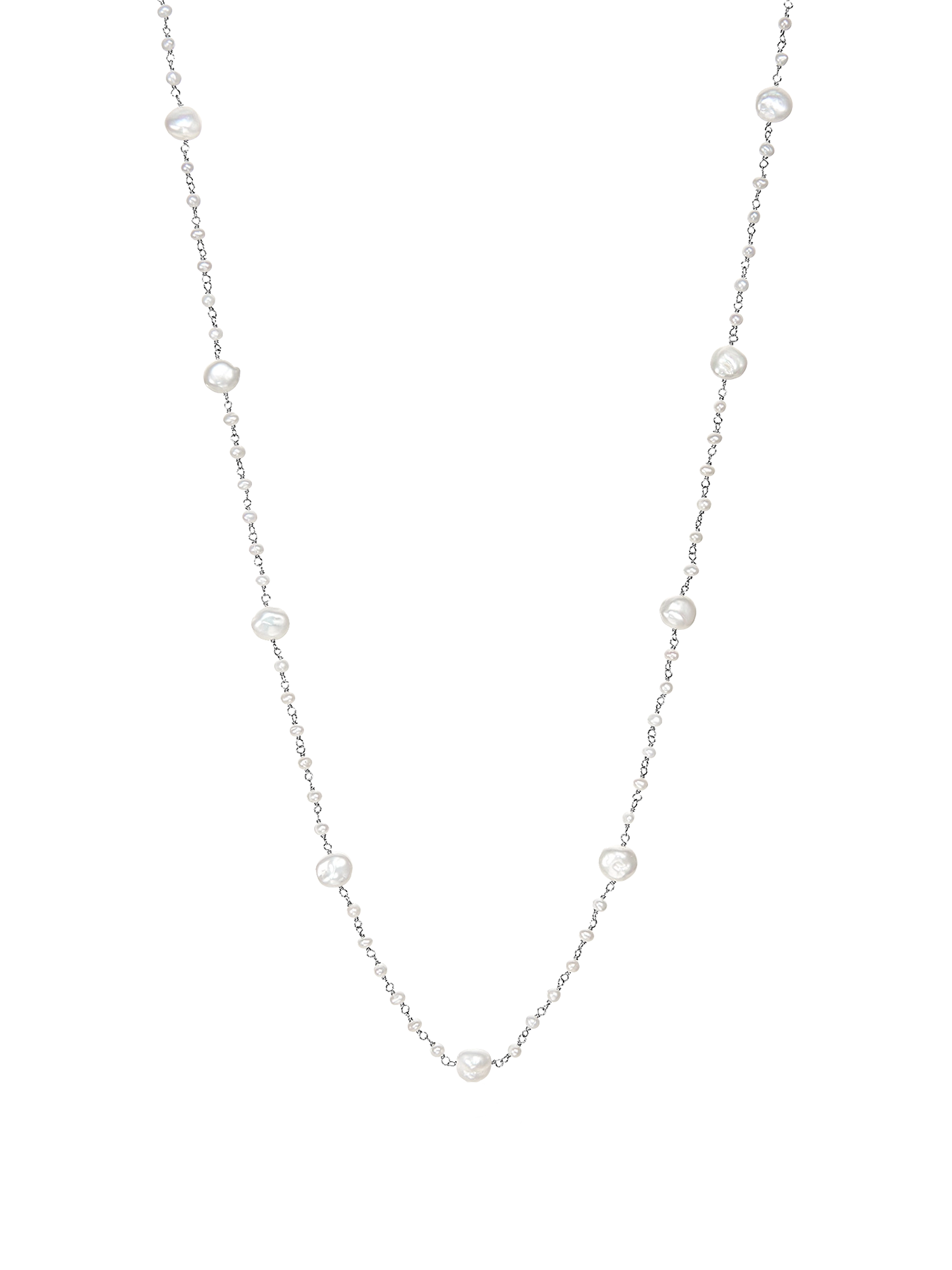 Keshi Pebble Necklace - mixed-size white freshwater pearl necklace in sterling silver, 36in by Nishi Pearls, studio view