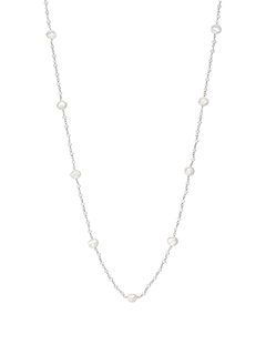 Keshi Pebble Necklace - mixed-size white freshwater pearl necklace in sterling silver, 36in by Nishi Pearls, studio view