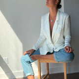 Lily Necklace - mixed-size white baroque freshwater pearls in sterling silver, 16-18in by Nishi Pearls, styled on a model