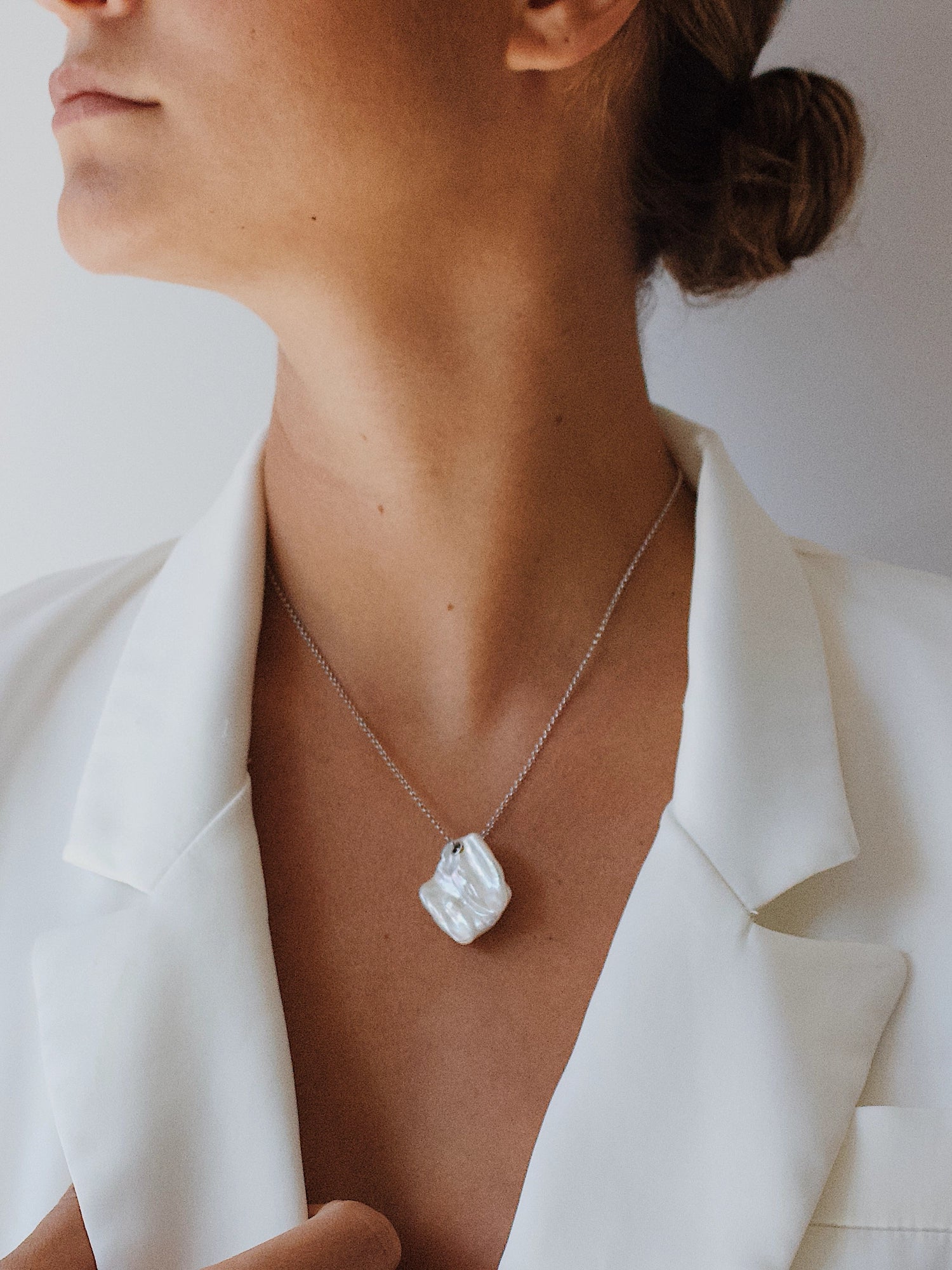 Lily Necklace - mixed-size white baroque freshwater pearls in sterling silver, 16-18in by Nishi Pearls, alternate model angle