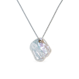 Lily Necklace - mixed-size white baroque freshwater pearls in sterling silver, 16-18in by Nishi Pearls, studio view
