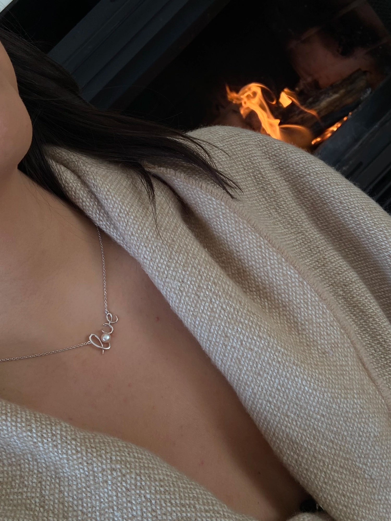 Love Necklace - 6-7mm pink freshwater pearl necklace in sterling silver, 16.5-18in by Nishi Pearls, worn on a model