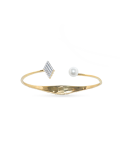 Opened Asymmetrical Bangle - 7-8mm white freshwater pearls in gold vermeil with white topaz by Nishi Pearls, studio view